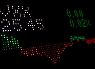 How Are ETFs Taxed In India? a close up of a clock with numbers on it