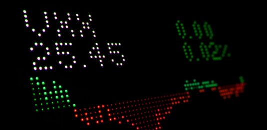 How Are ETFs Taxed In India? a close up of a clock with numbers on it
