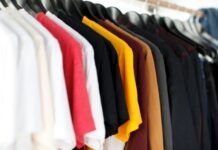 From Papers to Apparel: RAW Merchandise for the Eco-Friendly Lifestyle closeup of hanged shirts on rack