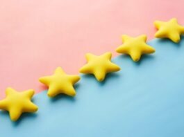 Quality First: The Science and Art of Ensuring Product Integrity a row of yellow stars sitting on top of a blue and pink surface