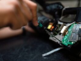 Best AI Tools for Android person holding green and black circuit board