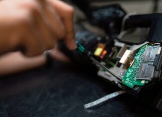 Best AI Tools for Android person holding green and black circuit board