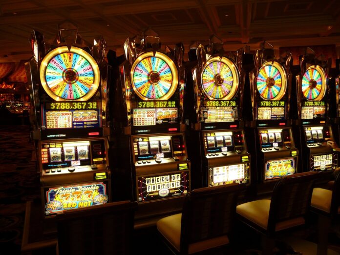 Photo by LoggaWiggler slot machine, one-armed bandit, money