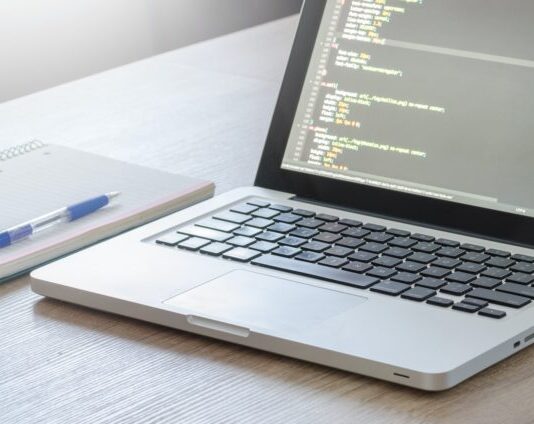 How Software Product Development Works: #7 Main Steps Turned-on Laptop Computer