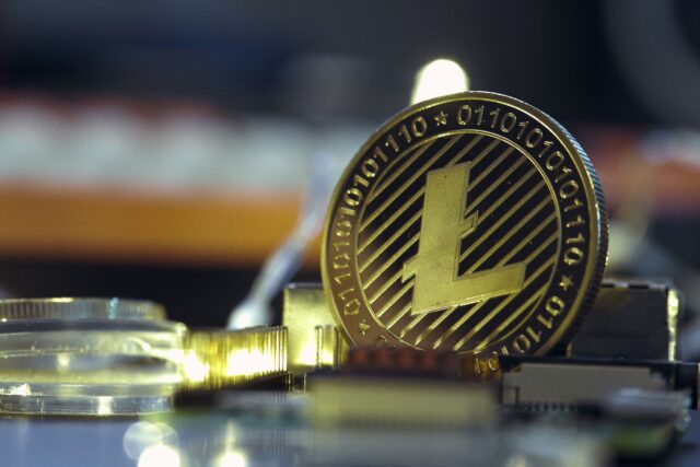 Photo by Michael Förtsch a close up of a bit coin on a table
