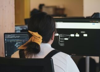 How To Best Optimize Your Cloud Resources woman in white long sleeve shirt