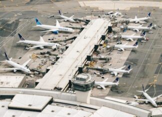Cargo Airlines See Increased Demand as E-Commerce Booms white and gray airplane on airport during daytime