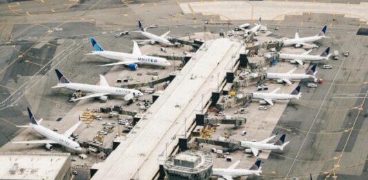 Cargo Airlines See Increased Demand as E-Commerce Booms white and gray airplane on airport during daytime