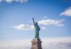 Unveiling the Key Moving Services for a Seamless Transition to the USA Statue of Liberty, New York under white and blue cloudy skies