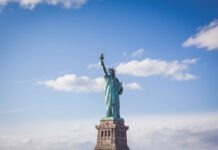 Unveiling the Key Moving Services for a Seamless Transition to the USA Statue of Liberty, New York under white and blue cloudy skies