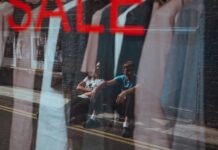 Home Staging Mastery: Presenting Your Property for a Swift Sale two people sitting on sidewalk