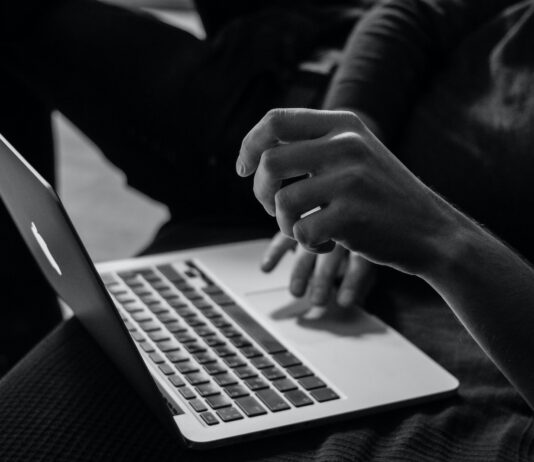 Top 10 Benefits of Using Proxies for Internet Browsing grayscale photo of person using MacBook