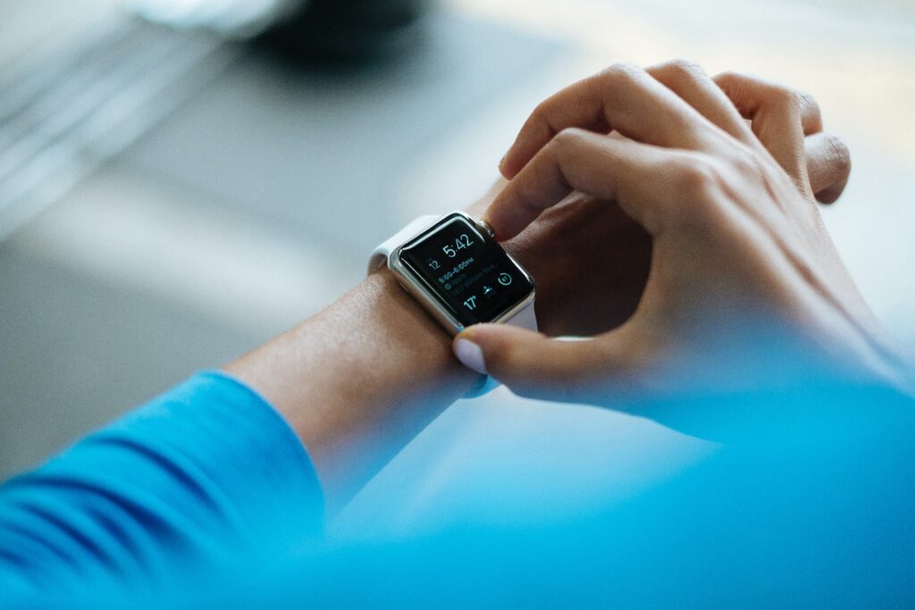 A person using a smart watch Description automatically generated
