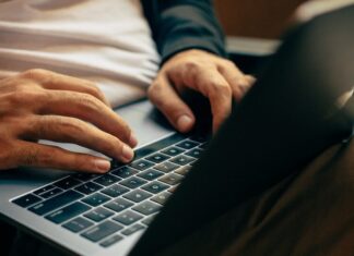 Is Cloud-Based Gaming the Next Big Step in the Online Gaming Sector? person using MacBok
