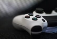 Level up Your Video Game Art: 5 Expert Tips to Follow closeup of white Sony PS4 controller