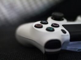 Level up Your Video Game Art: 5 Expert Tips to Follow closeup of white Sony PS4 controller