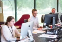 Windstream Customer Service: Guiding the Path to Seamless Connectivity man sitting in front of table