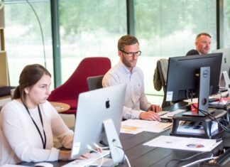 Windstream Customer Service: Guiding the Path to Seamless Connectivity man sitting in front of table