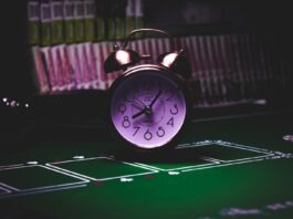 The Ethical Debate Surrounding Casino Bonuses silver twin bell alarm clock on green table