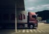 Are You Making These Trucking Company Mistakes? box truck passing through toll gate