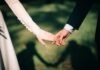 Demystifying Marriage Green Card Income Criteria: Your Complete Handbook man and woman holding hands focus photo