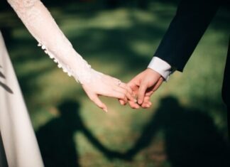 Demystifying Marriage Green Card Income Criteria: Your Complete Handbook man and woman holding hands focus photo