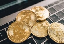 Binance Smart Chain’s DeFi Explosion: Risks and Opportunities Gold Coins on the Laptop