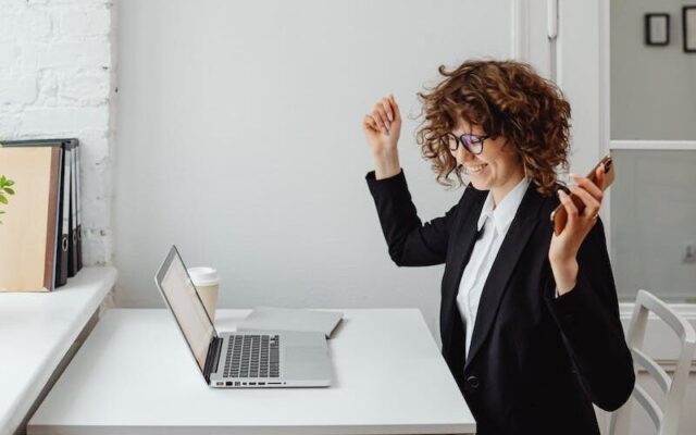 Photo by Karolina Grabowska A Woman in Black Blazer Sitting in Front of the Table with Laptop