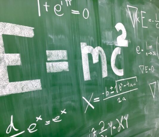 How to Make the Most of Your Physics Course: Tips for IB Students a chalkboard with some writing on it