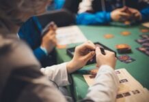 Five Reasons Bankroll Management Is So Important At Online Casinos Crop people playing cards at table