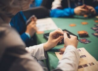Five Reasons Bankroll Management Is So Important At Online Casinos Crop people playing cards at table