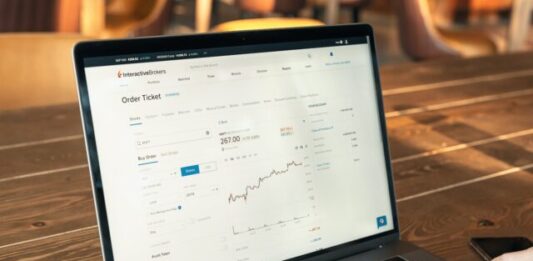 From Criticism to Conversion: Unleashing the Potential of Online Reputation Management person using macbook pro on brown wooden table
