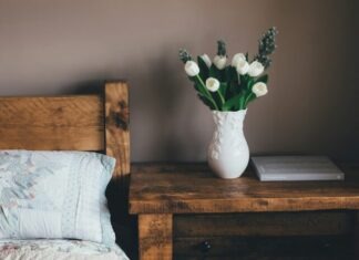 How To Decorate Your Interior With Florals white flower vase on surface