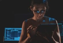 Digital Identity Protocols for People and Bots a person wearing glasses