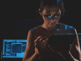 Digital Identity Protocols for People and Bots a person wearing glasses