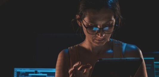 Digital Identity Protocols for People and Bots a person wearing glasses