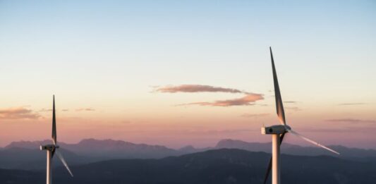 Looking for the Best Energy Plans? Look No Further Than Energy Outlet two white wind turbines