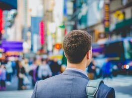 Explore Job Roles and Opportunities in European NGOs shallow focus photography of man in suit jacket's back