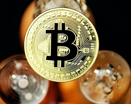 Beyond the Hype: A Realistic Approach to Bitcoin and Cryptocurrencies gold and black star print round ornament