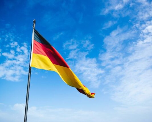 Bitcoin Boom: Exploring Germany’s Legal Landscape in the Cryptocurrency Revolution blue, red, and yellow flag