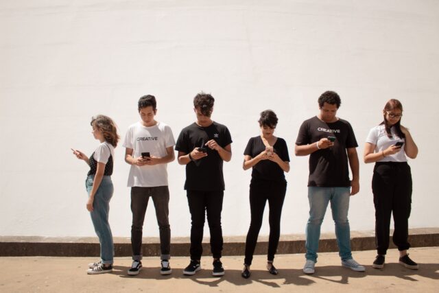 Photo by Creative Christians group of people standing on brown floor