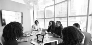 Tech Trends Analysis: Anticipating Market Shifts with Product Intelligence people sitting beside rectangular table beside window