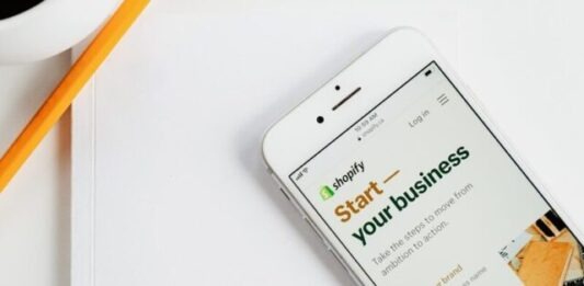 Why You Need an Ecommerce Mobile App for Your Business silver iphone 6 on white table