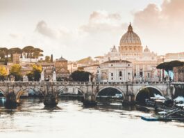 Exploring Italy’s Vibrant Nightlife: From Historic Piazzas to Chic Beach Clubs brown dome concrete building near bridge at daytime