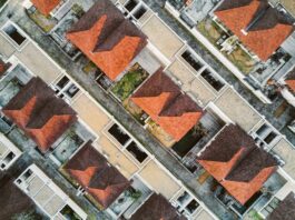 Real Estate Agents and Their Role in Urban Planning areal photography of brown building