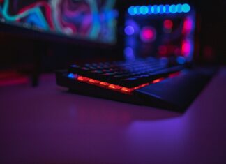 How to Improve Your Rust Gaming Experience black computer keyboard on brown wooden table