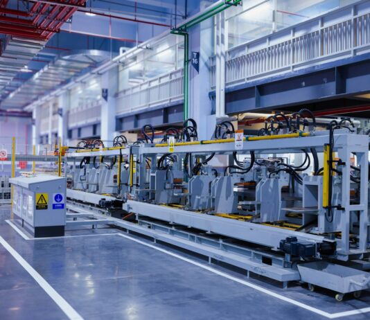 How Does an Extrusion Extruder Work? a large machine in a large building
