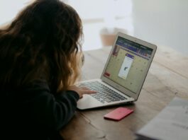 The Future of Work: How Online Degrees are Reshaping Careers woman in black long sleeve shirt using macbook air