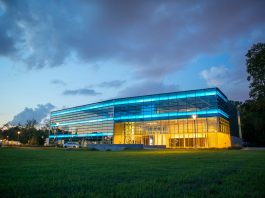 Innovative Applications for Power Tracks in Modern Work Environments white and blue building under cloudy sky during daytime