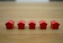 Top Mistakes to Avoid When Filing a Homeowners Insurance Claim red blocks on brown wooden table